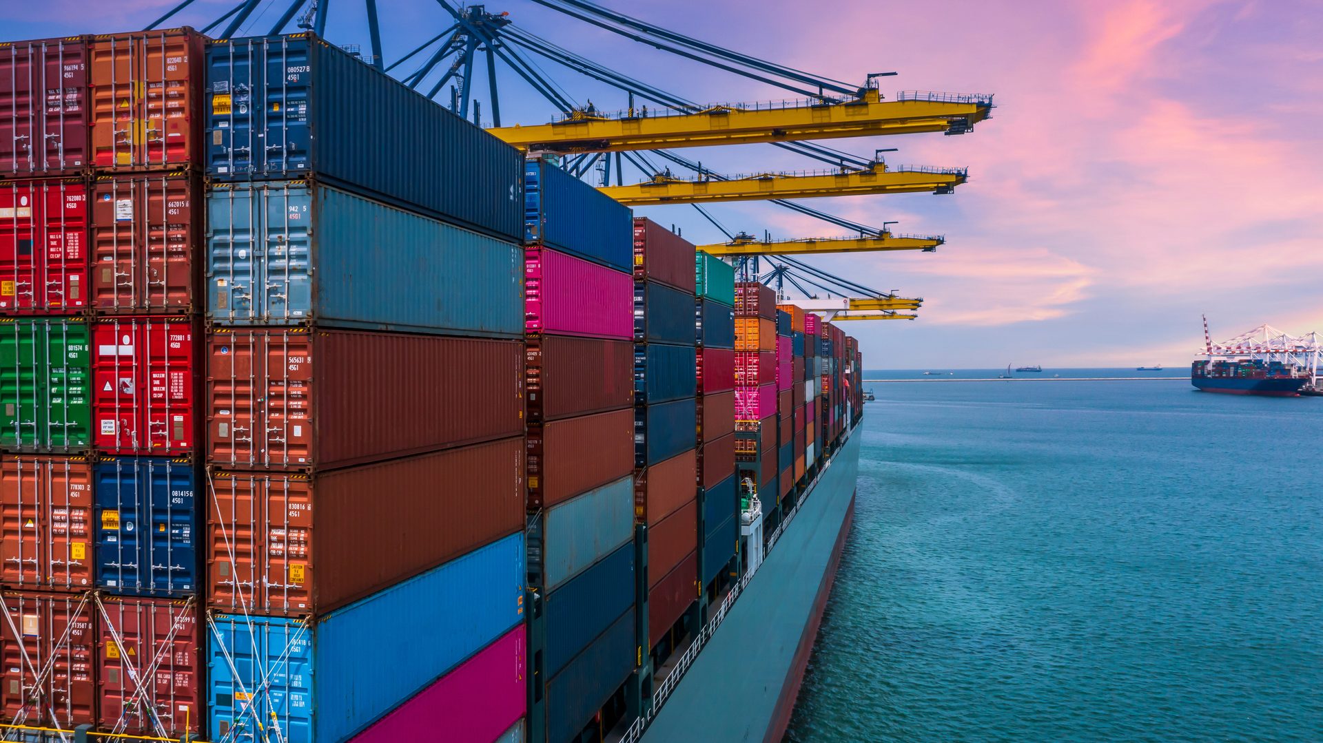 Container ship being loaded at port